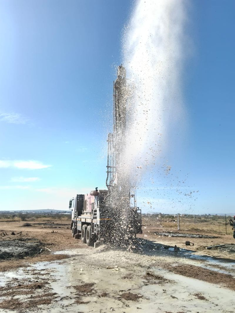 Aqualine Drilling rig striking water on site